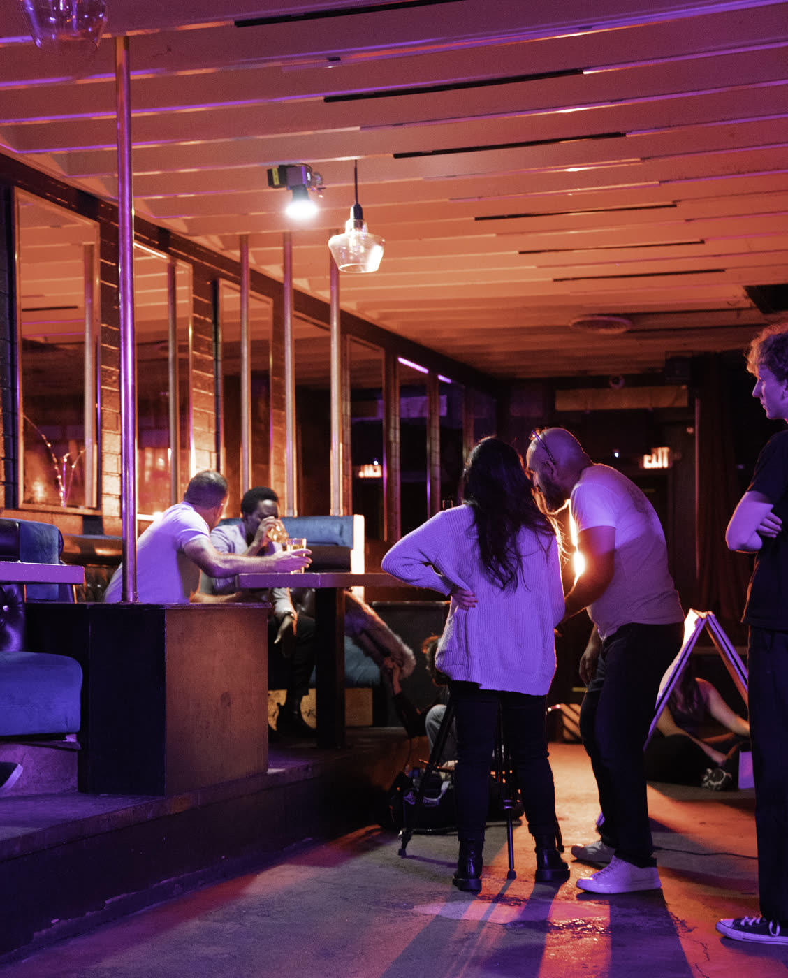 A lounge set lit in purple and orange on Fair Trade