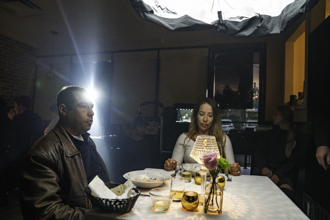Lighting a dinner scene on the set of Fair Trade