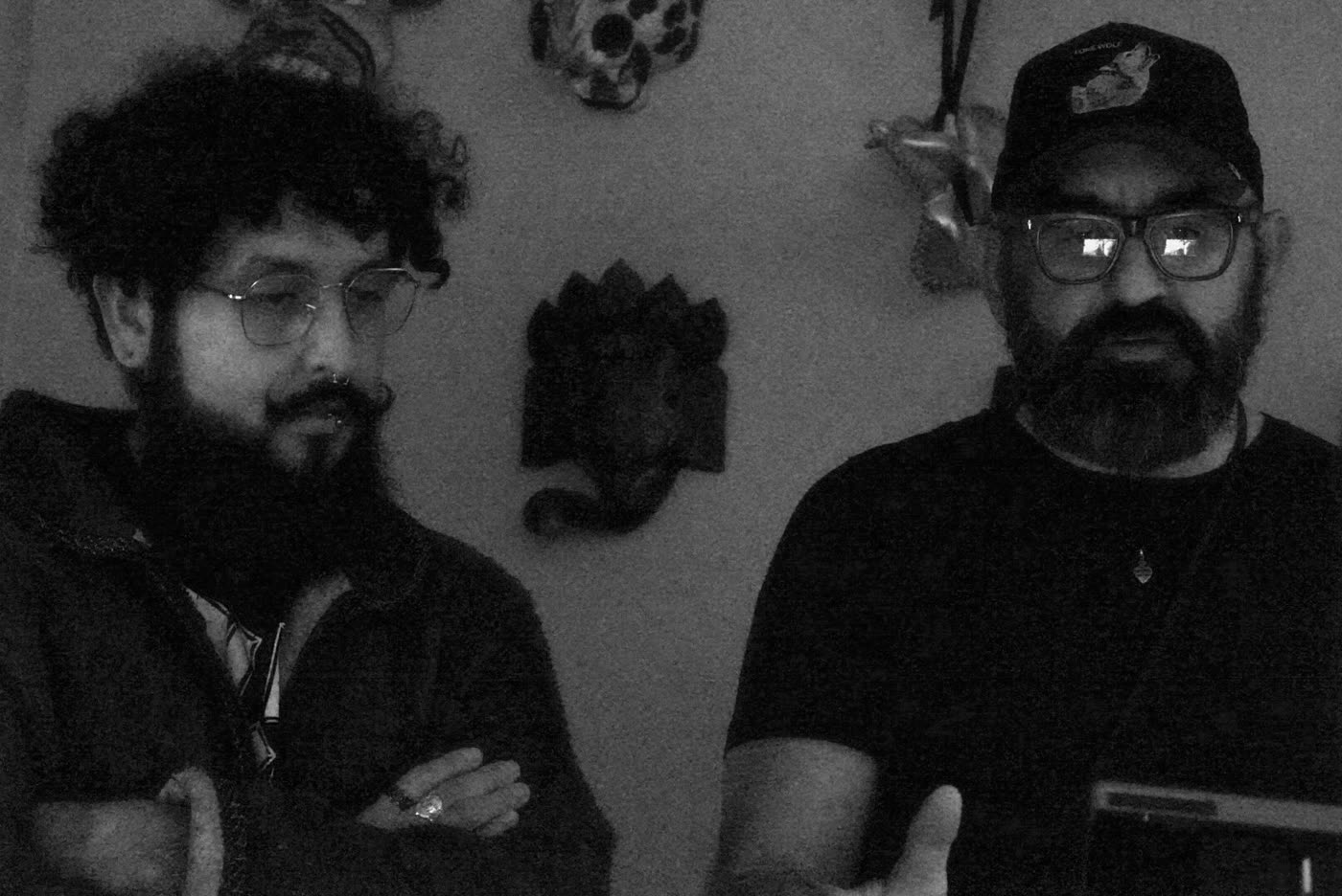 Oz Riveros and a crew member watching the monitor