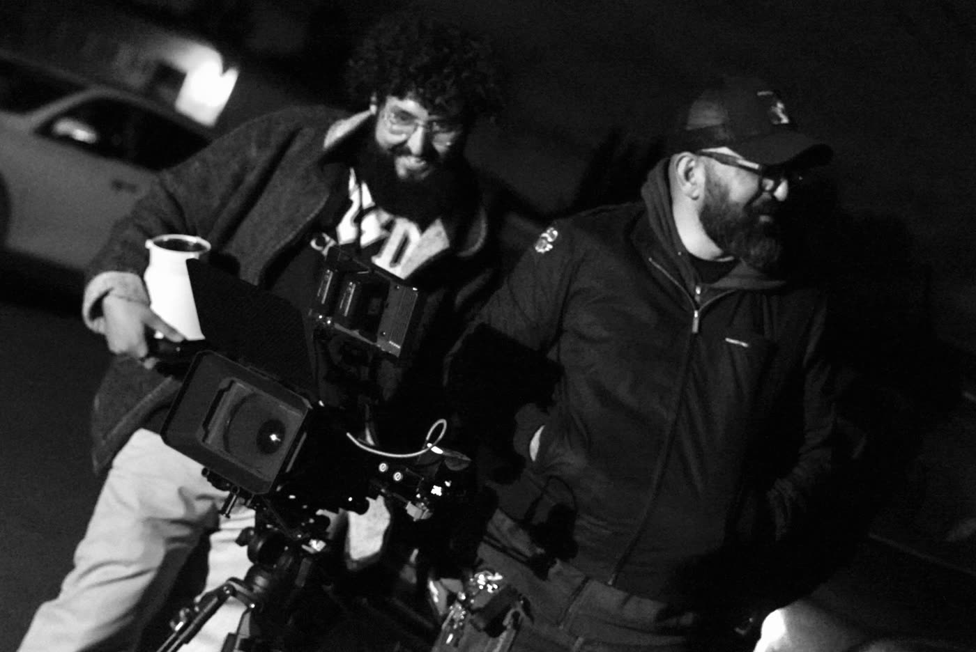 The camera crew outside at night