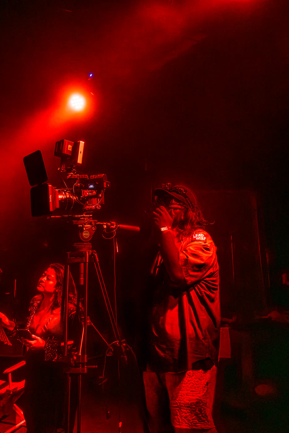 Camera operator on the Venom music video set