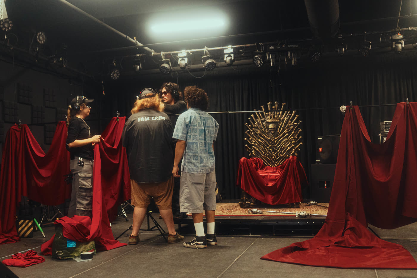 Crew dressing the stage before the Venom shoot