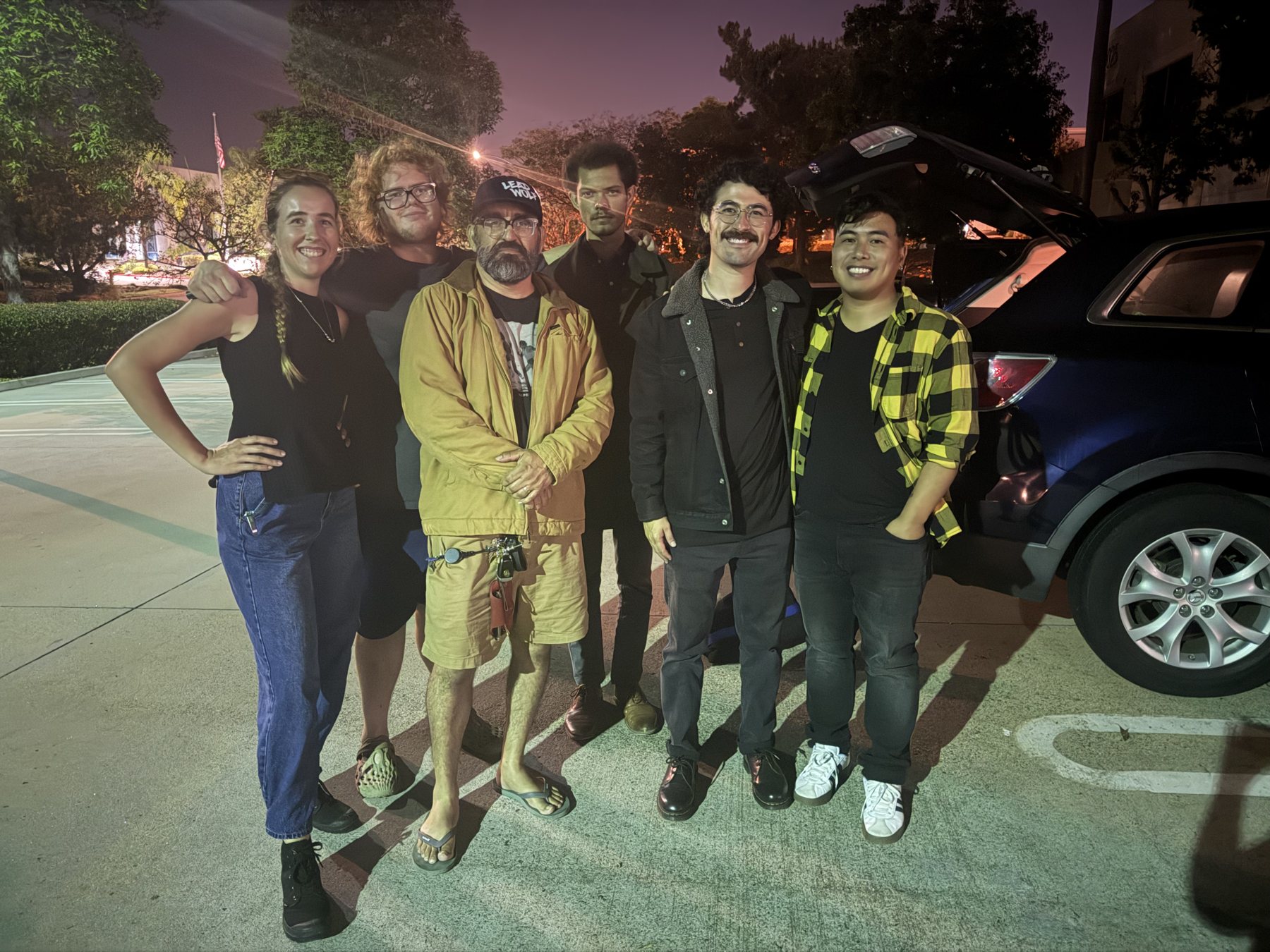 The crew and cast on the car night
